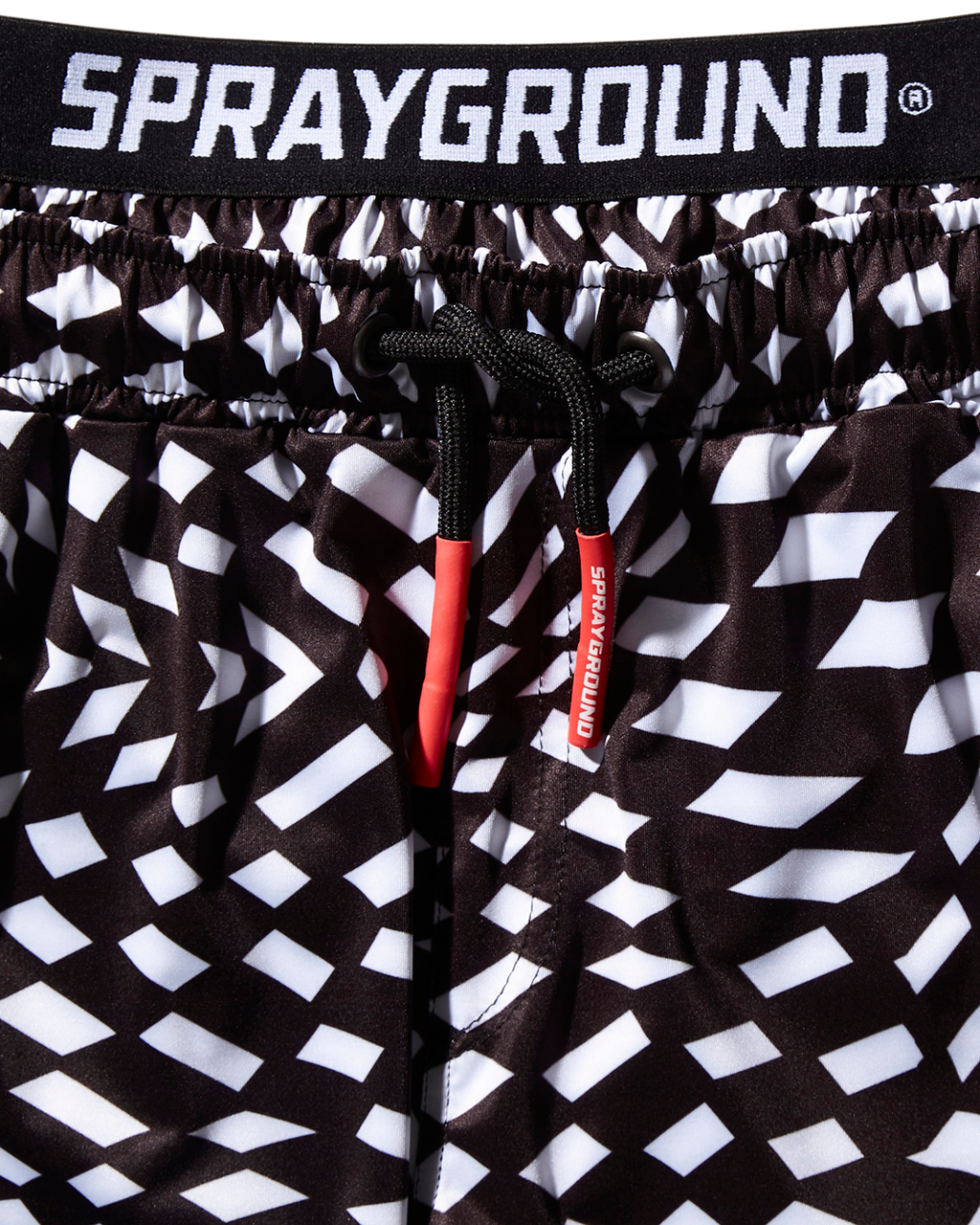 KIDS TRIPPY SWIM TRUNKS